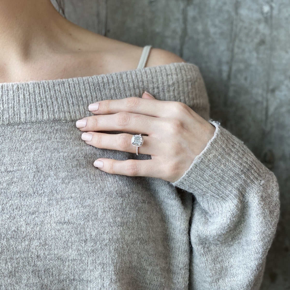 Two tone rose gold and platinum cushion cut halo engagement ring