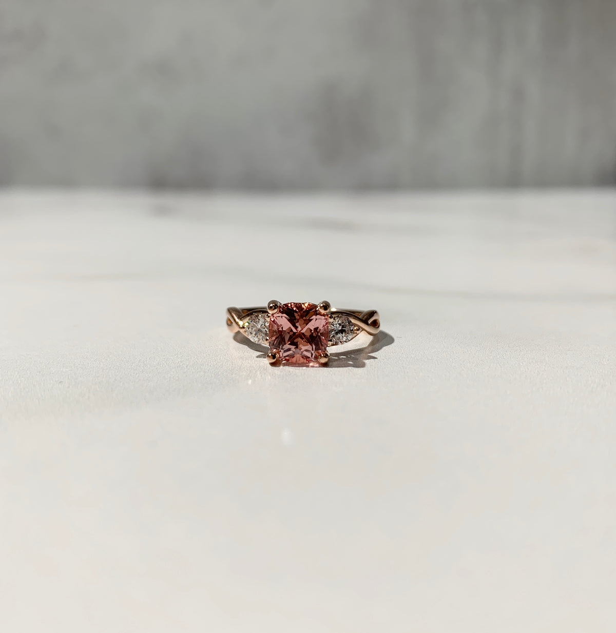 Cushion cut champagne sapphire three stone ring