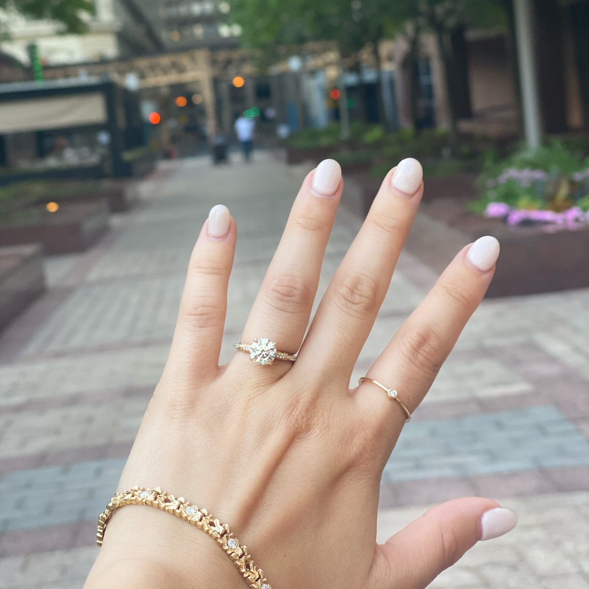 Yellow Gold Lourdes ring on hand