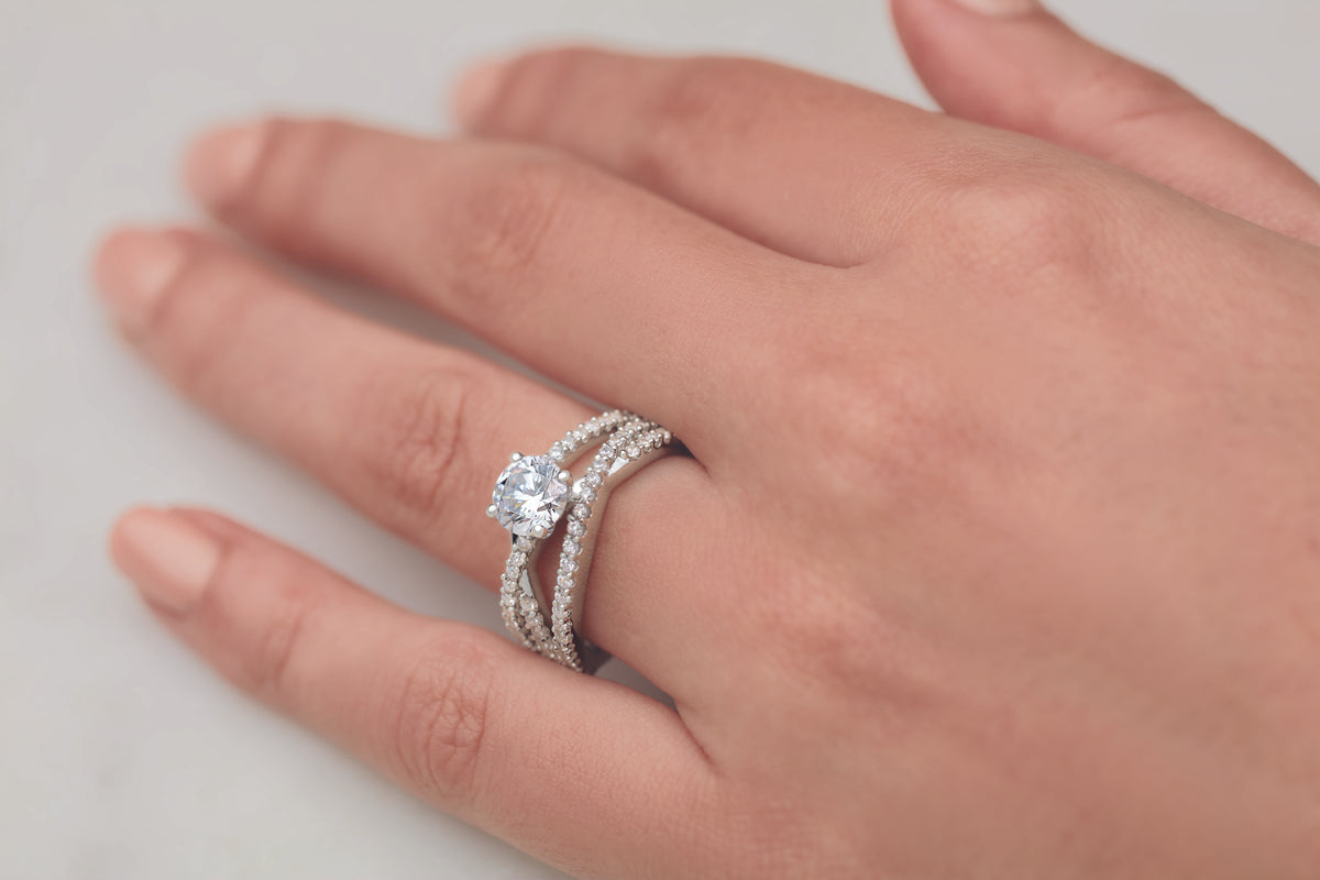 Multi band criss cross engagement ring